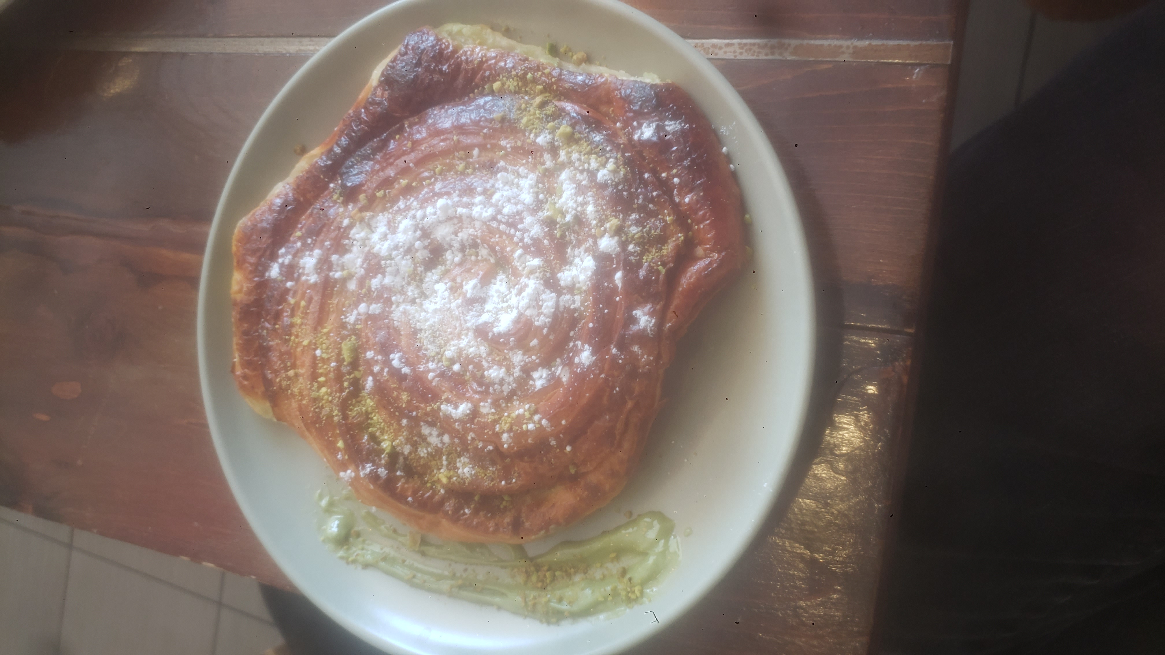 Crossiant on a plate.
